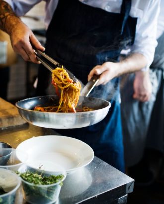 chef-cooking-spaghetti-kitchen