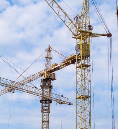 crane-and-a-building-under-construction-against-a-2023-11-27-05-11-02-utc (1)